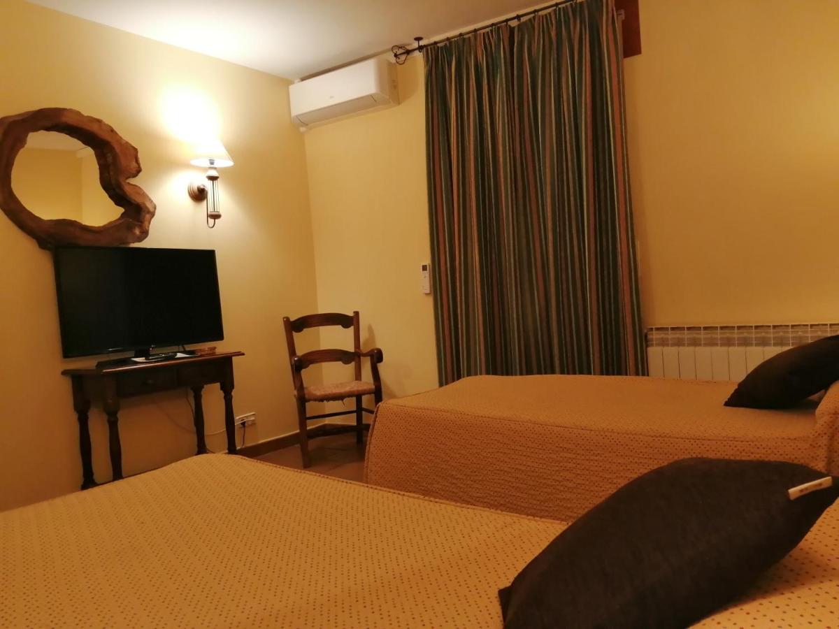 Cama o camas de una habitación en Hotel Rural & SPA Puente del Duratón