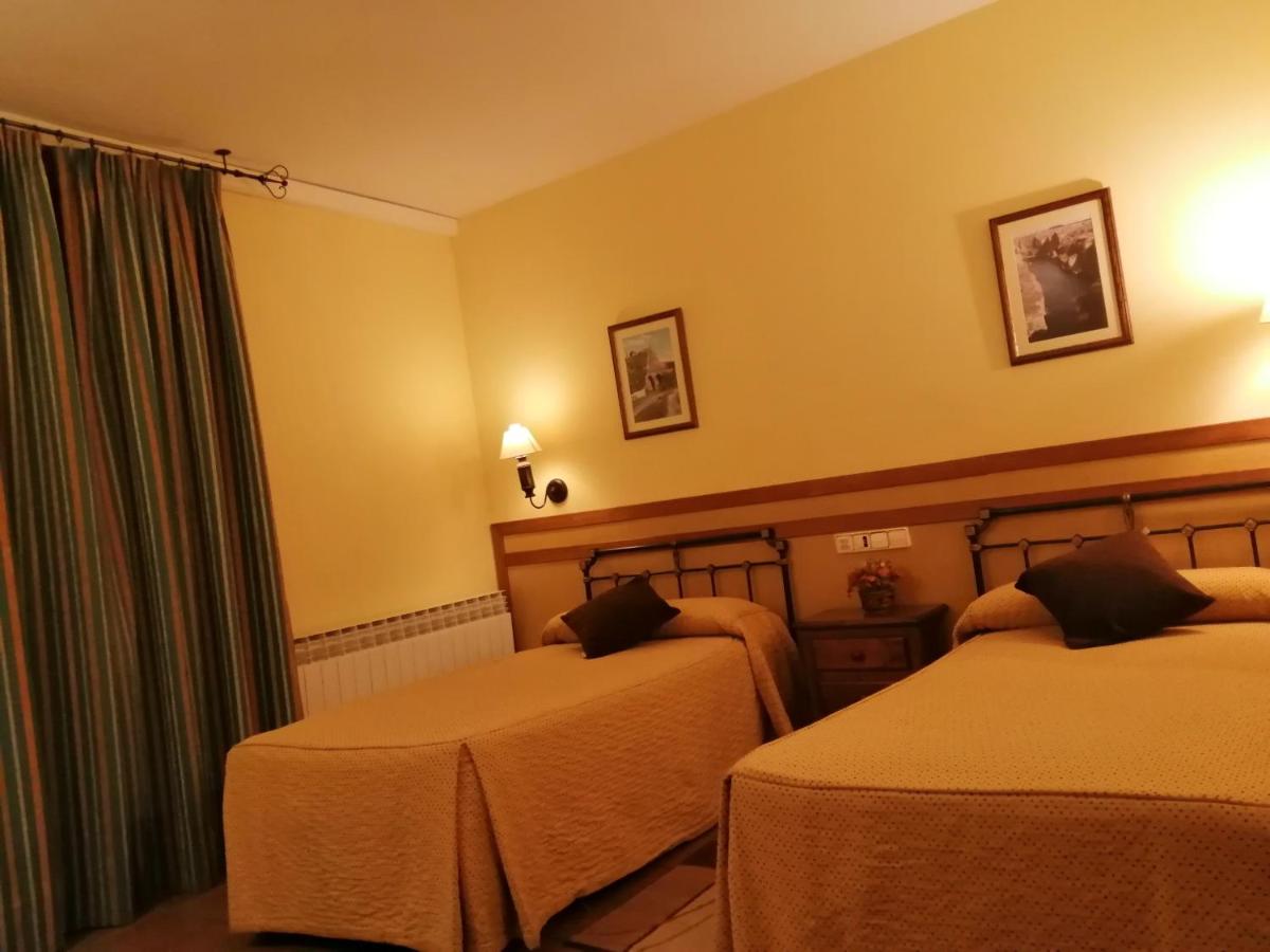 Cama o camas de una habitación en Hotel Rural & SPA Puente del Duratón