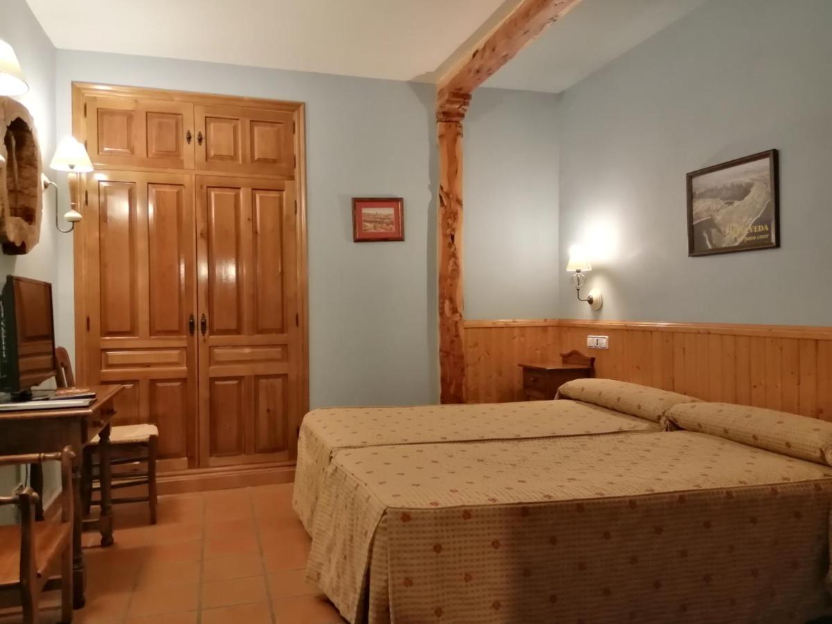 Cama o camas de una habitación en Hotel Rural & SPA Puente del Duratón