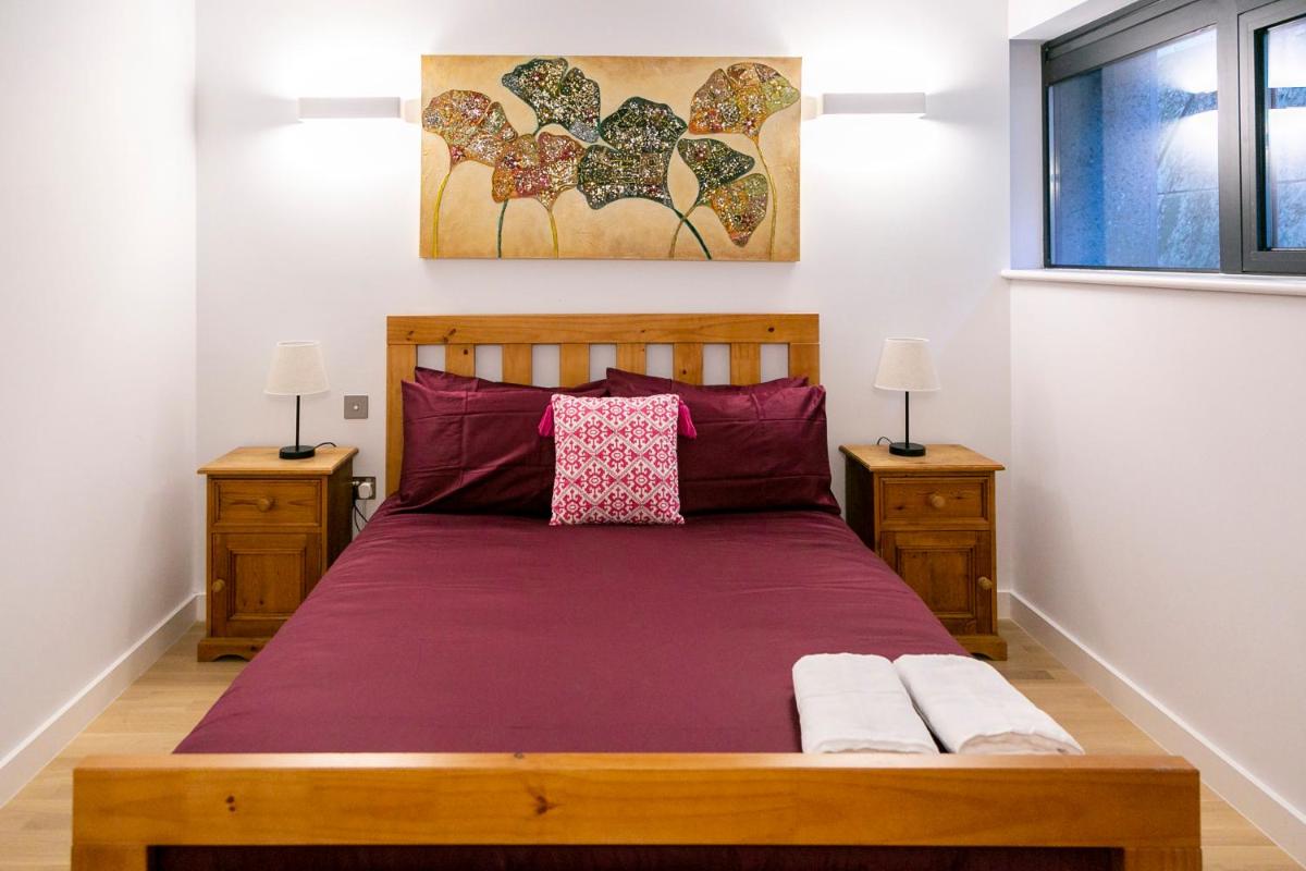 Modern and bright two story apartment - Super central location. - Housity