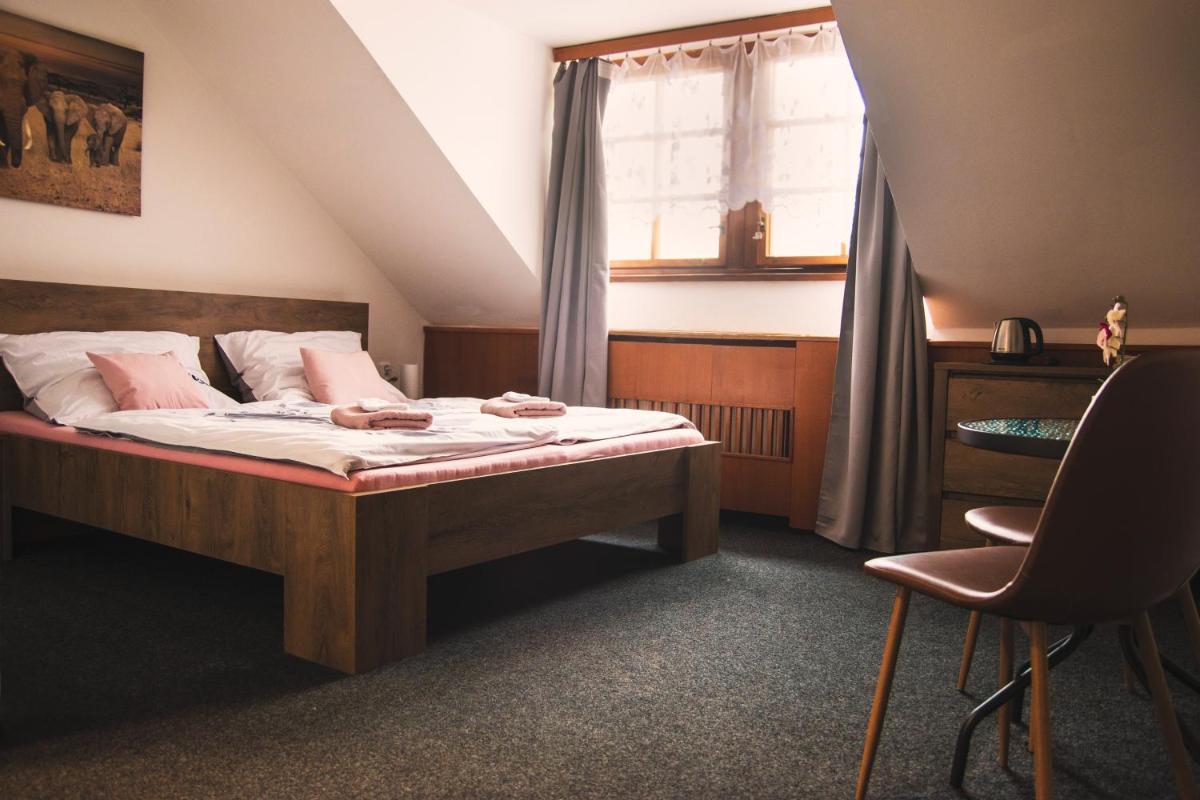 Guesthouse Zlatý Hrozen - Housity