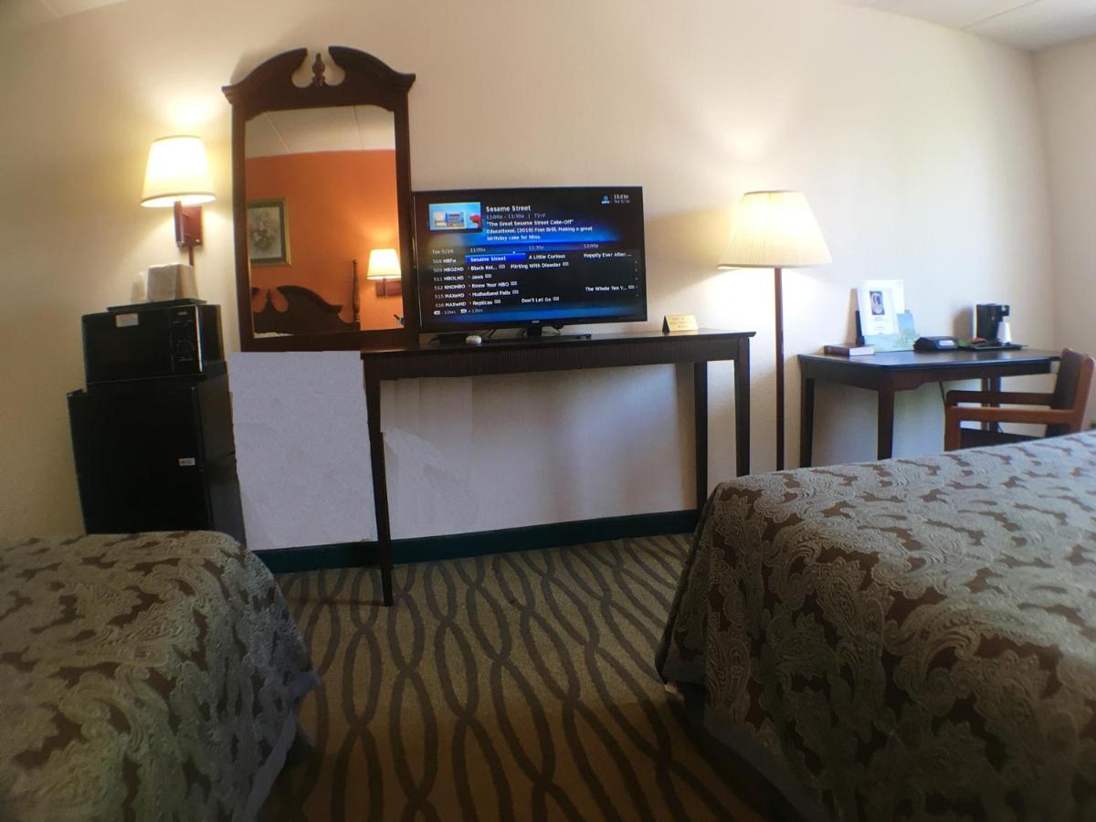President Inn & Suites - Housity