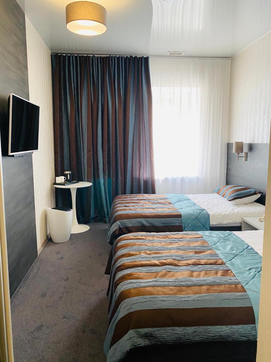 Status Hotel - Housity