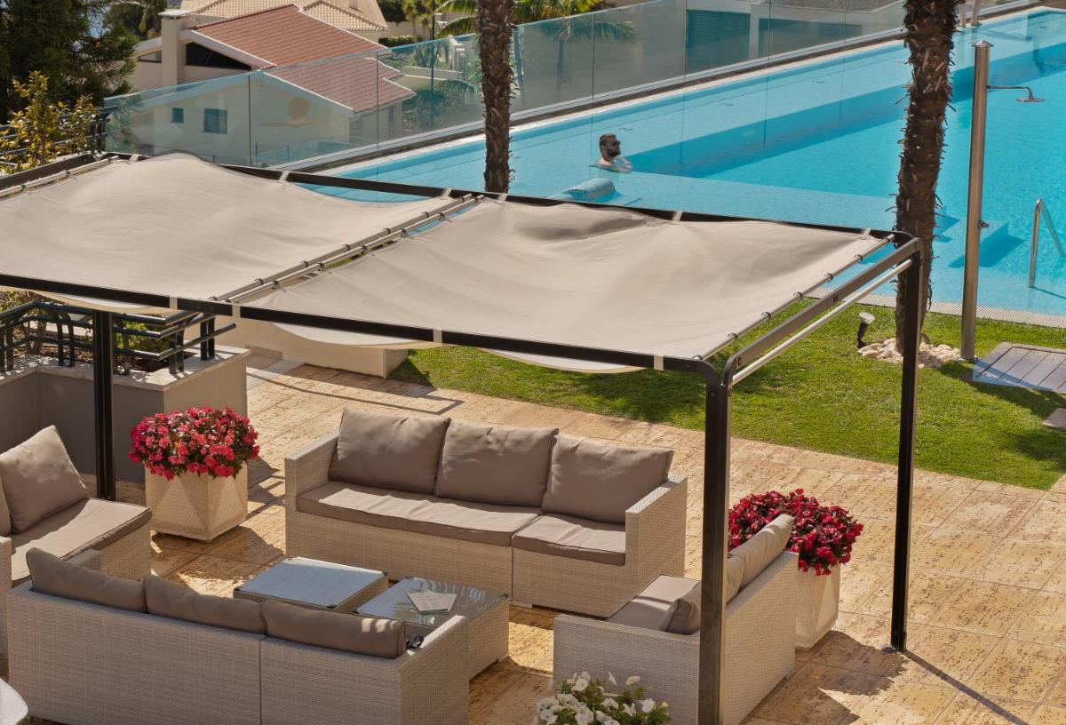A piscina em ou perto de Madeira Panorâmico Hotel