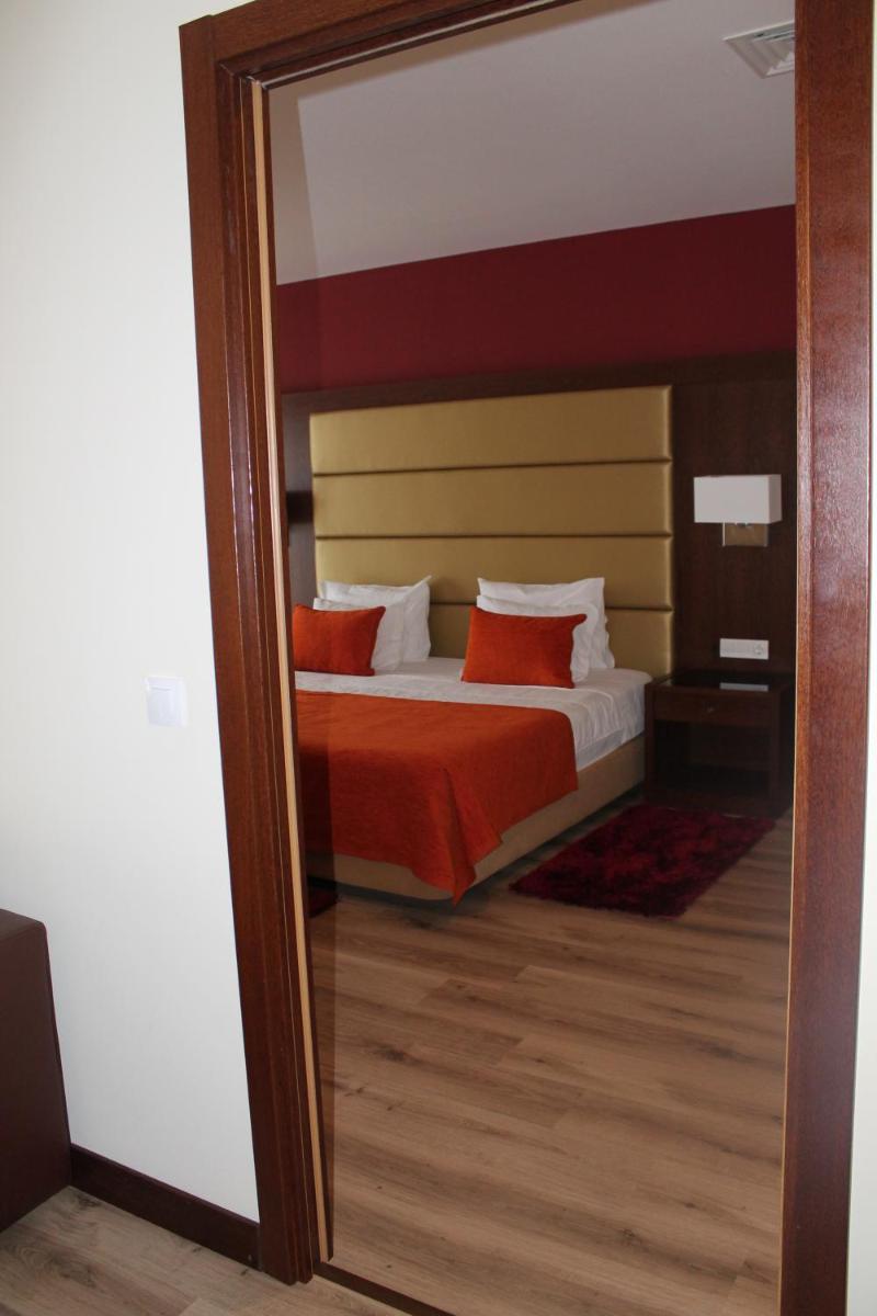 Uma cama ou camas num quarto em Palace Hotel & SPA Termas do Bicanho