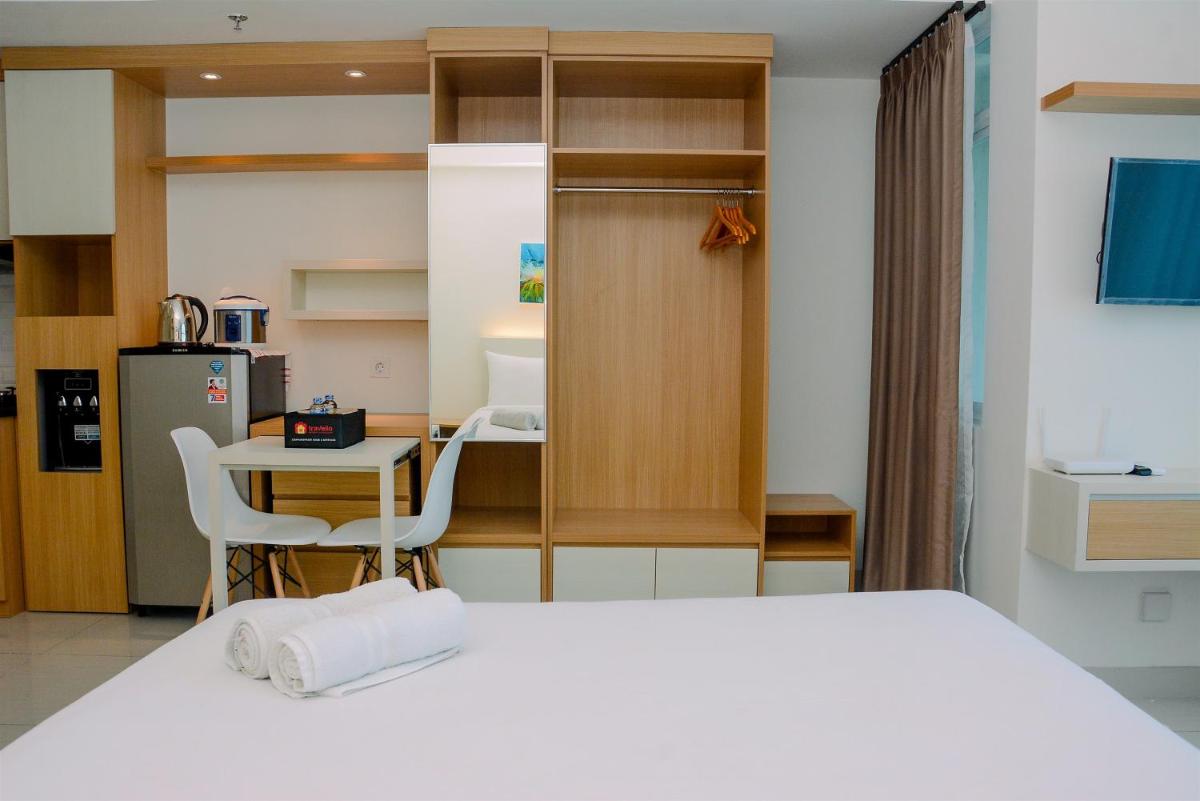 Simple Studio Apartment at Grand Kamala Lagoon By Travelio - Housity