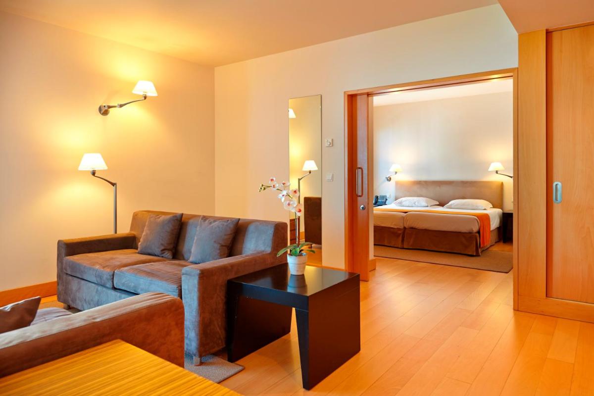 Uma cama ou camas num quarto em Golden Residence Hotel