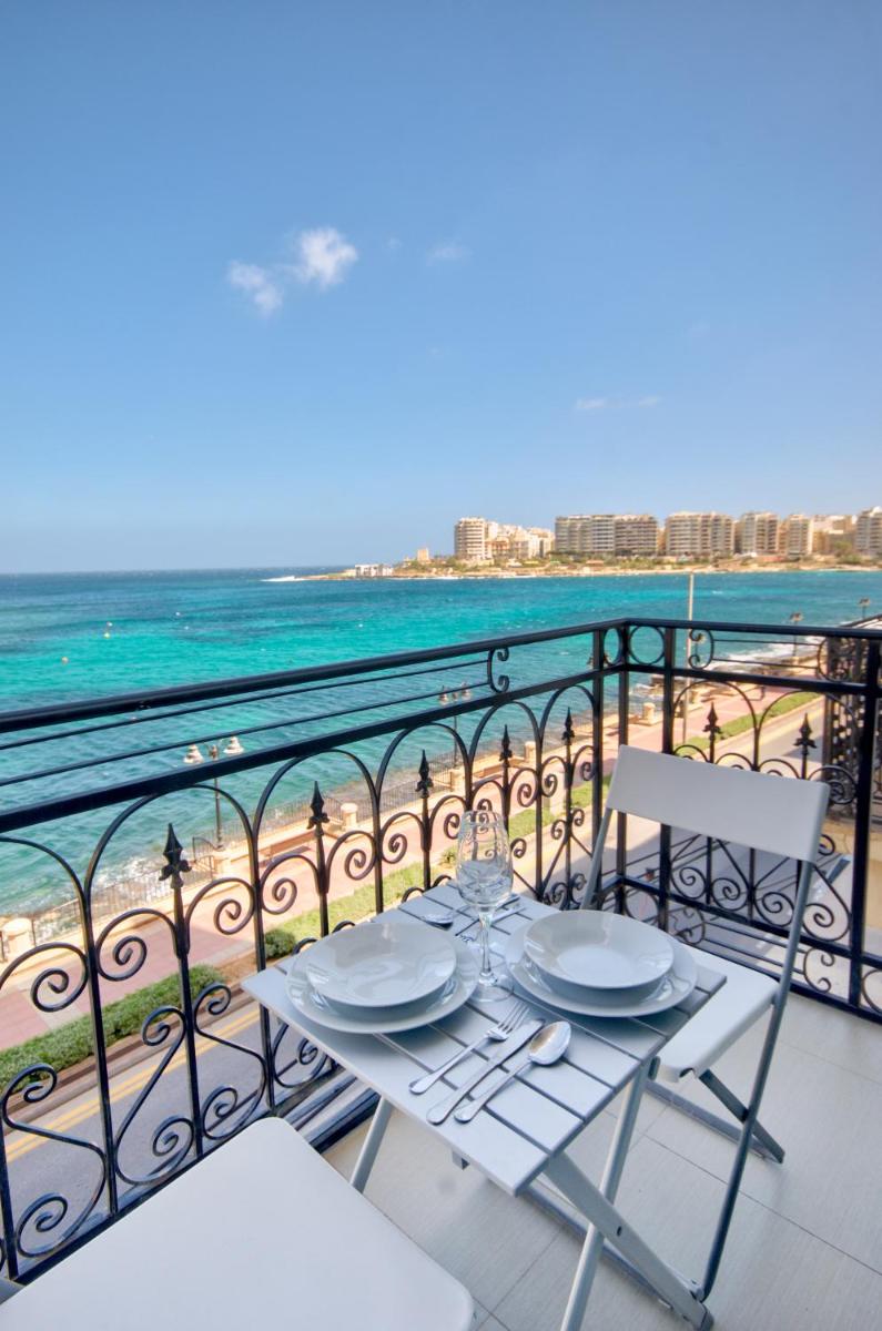 St Julians 2 Bedroom Apartment with Commanding Seaviews by ShortletsMalta - Housity