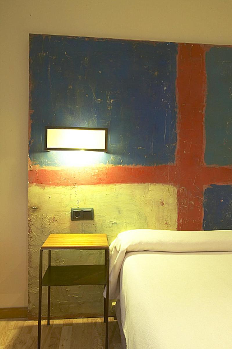 Cama o camas de una habitación en Hotel Santa Cristina Petit Spa