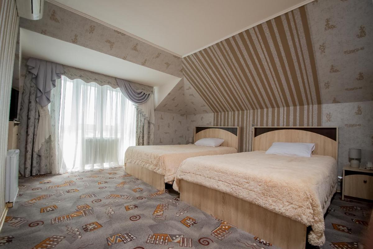 Hotel Zolotoi Lev - Housity