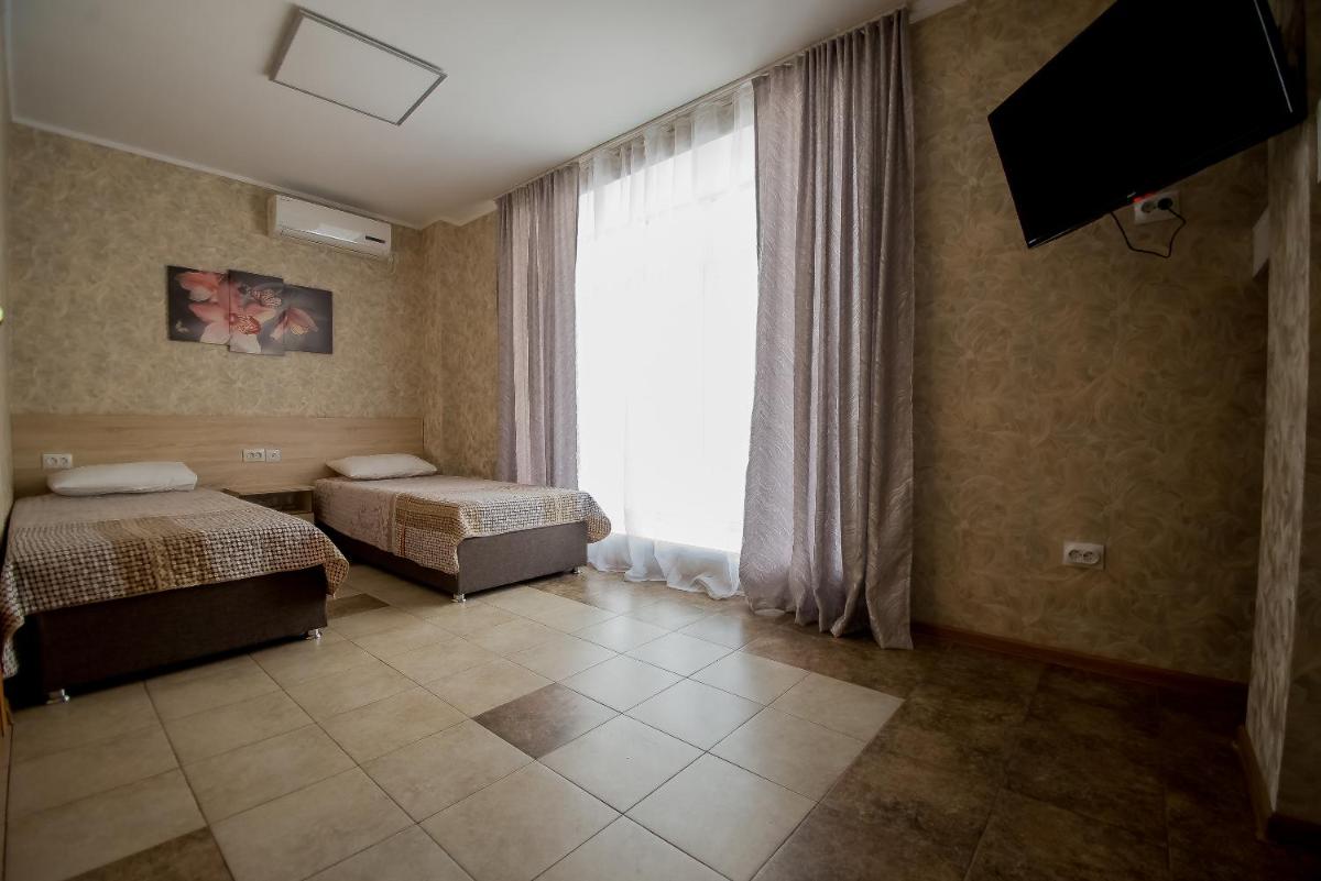 Hotel Zolotoi Lev - Housity