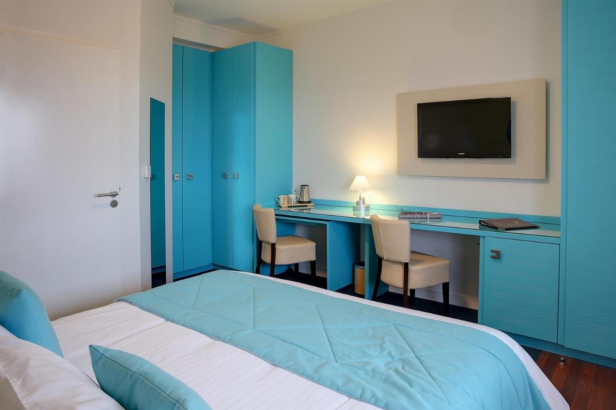 Un ou plusieurs lits dans un hébergement de l'établissement Best Western Plus Les Terrasses de Bréhat