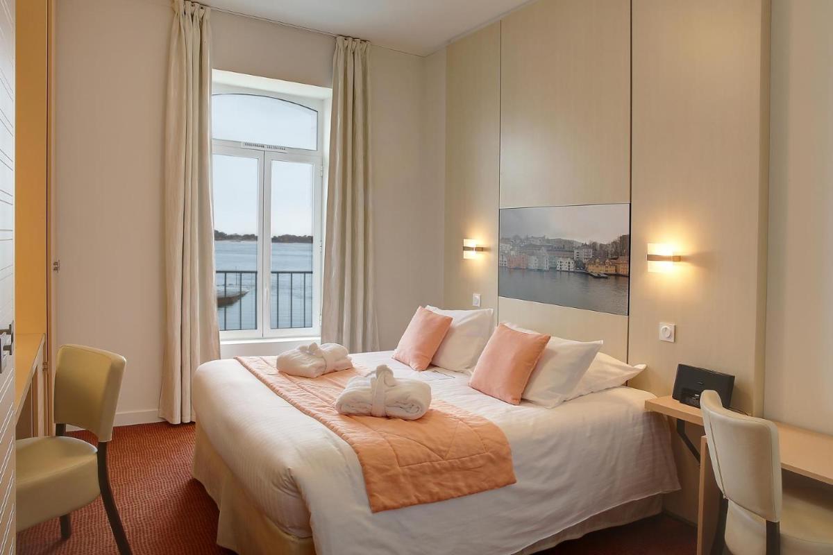 Un ou plusieurs lits dans un hébergement de l'établissement Best Western Plus Les Terrasses de Bréhat