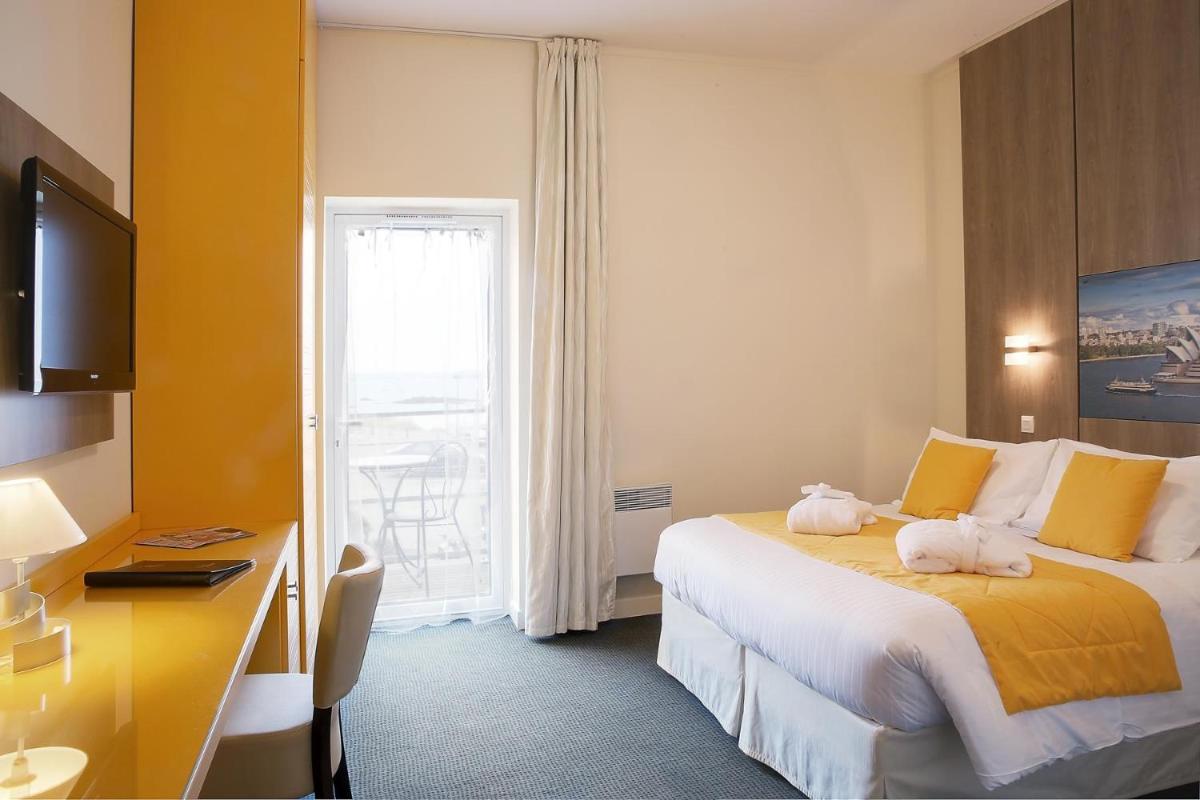Un ou plusieurs lits dans un hébergement de l'établissement Best Western Plus Les Terrasses de Bréhat