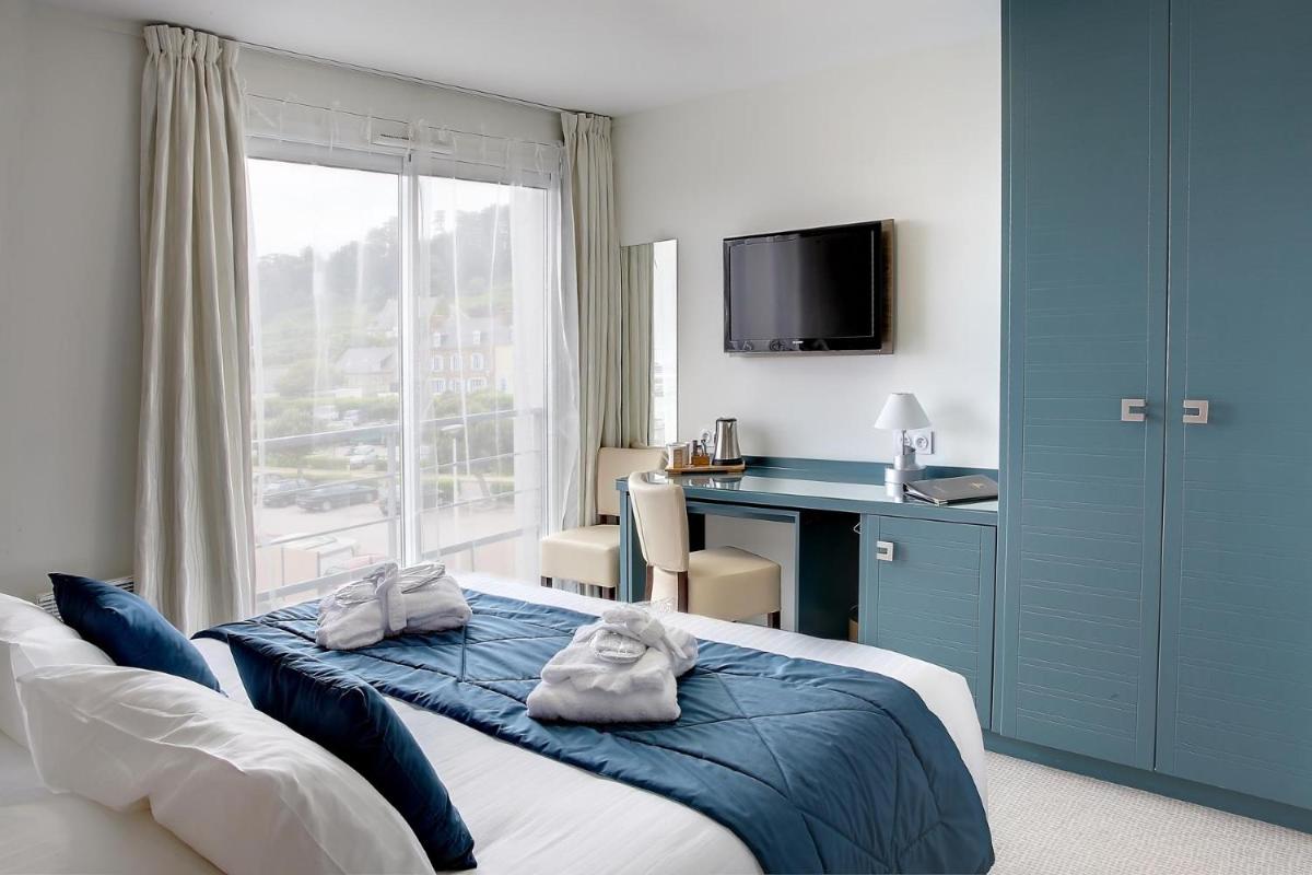 Un ou plusieurs lits dans un hébergement de l'établissement Best Western Plus Les Terrasses de Bréhat
