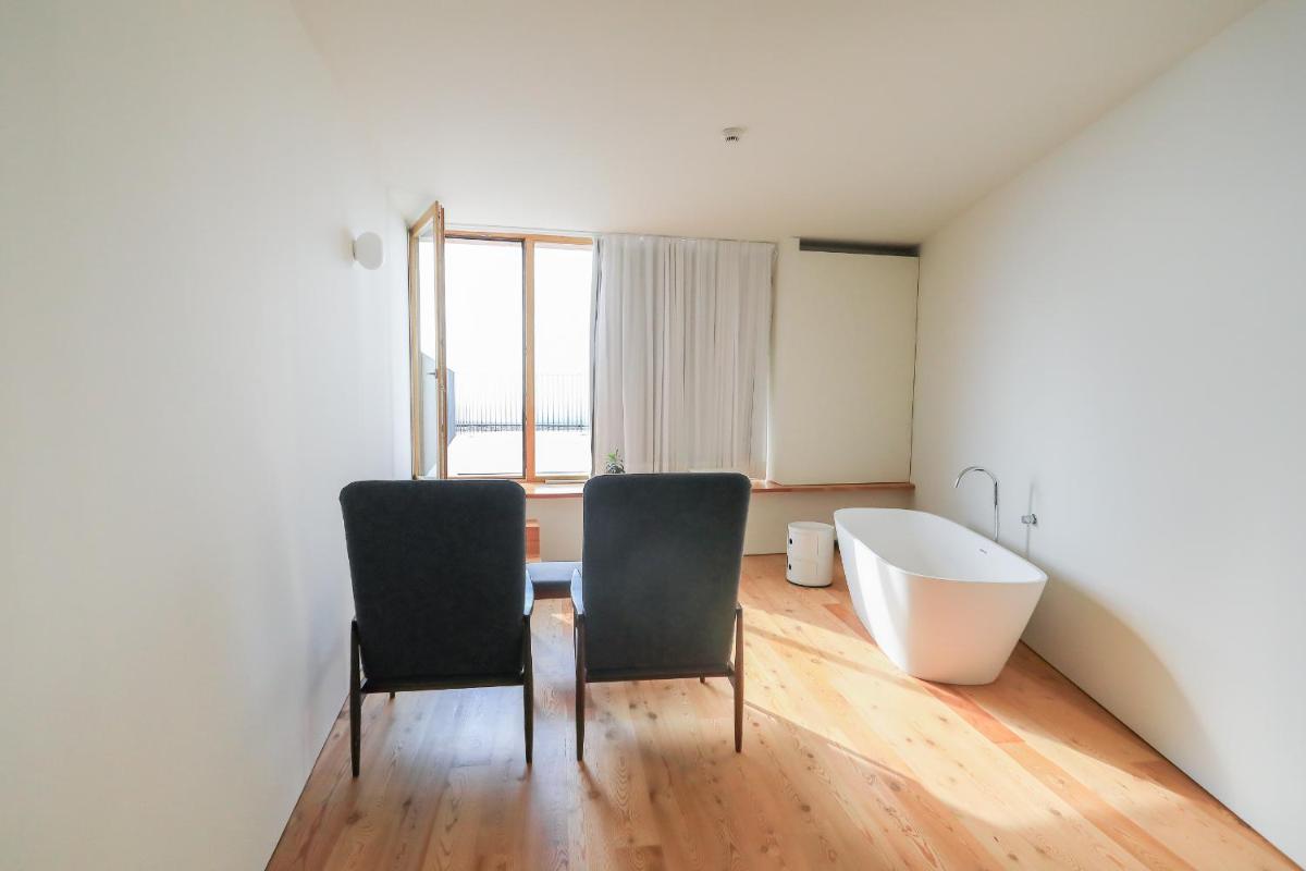 Uma área de estar em Casas Da Lapa, Nature & Spa Hotel
