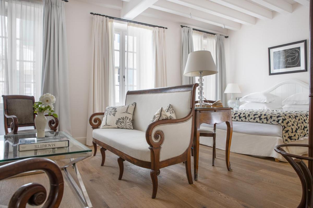 Un ou plusieurs lits dans un hébergement de l'établissement Villa Clarisse & Spa by Olivier Claire