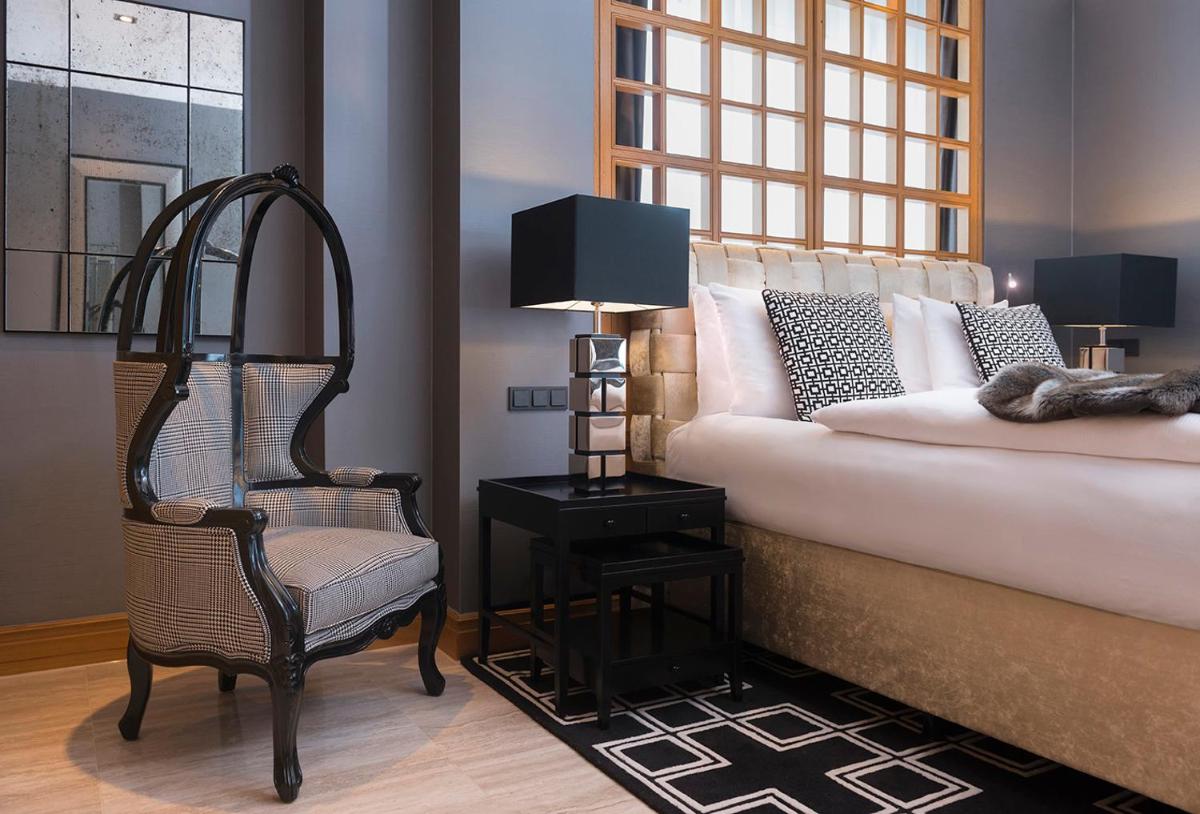 Ein Bett oder Betten in einem Zimmer der Unterkunft Hotel Palace Berlin