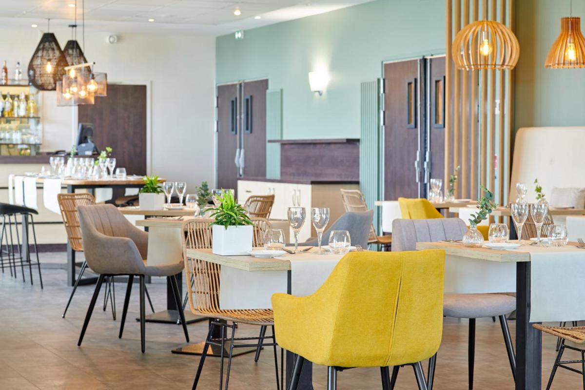 Restaurant ou autre lieu de restauration dans l'établissement Les Terrasses d'Atlanthal