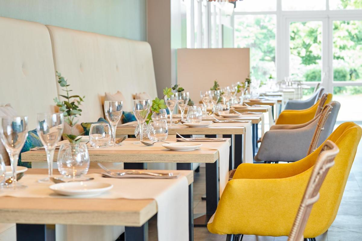 Restaurant ou autre lieu de restauration dans l'établissement Les Terrasses d'Atlanthal