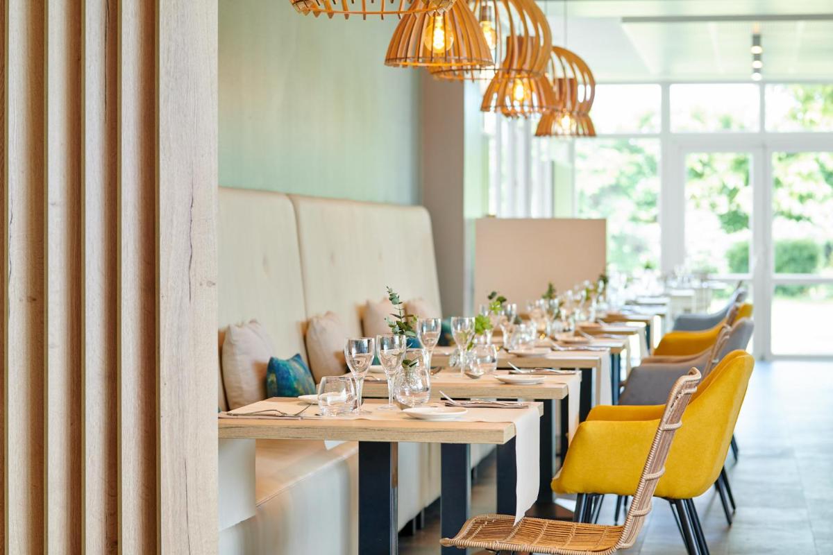 Restaurant ou autre lieu de restauration dans l'établissement Les Terrasses d'Atlanthal