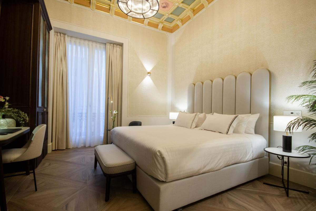 Cama o camas de una habitación en MYR Palacio Vallier