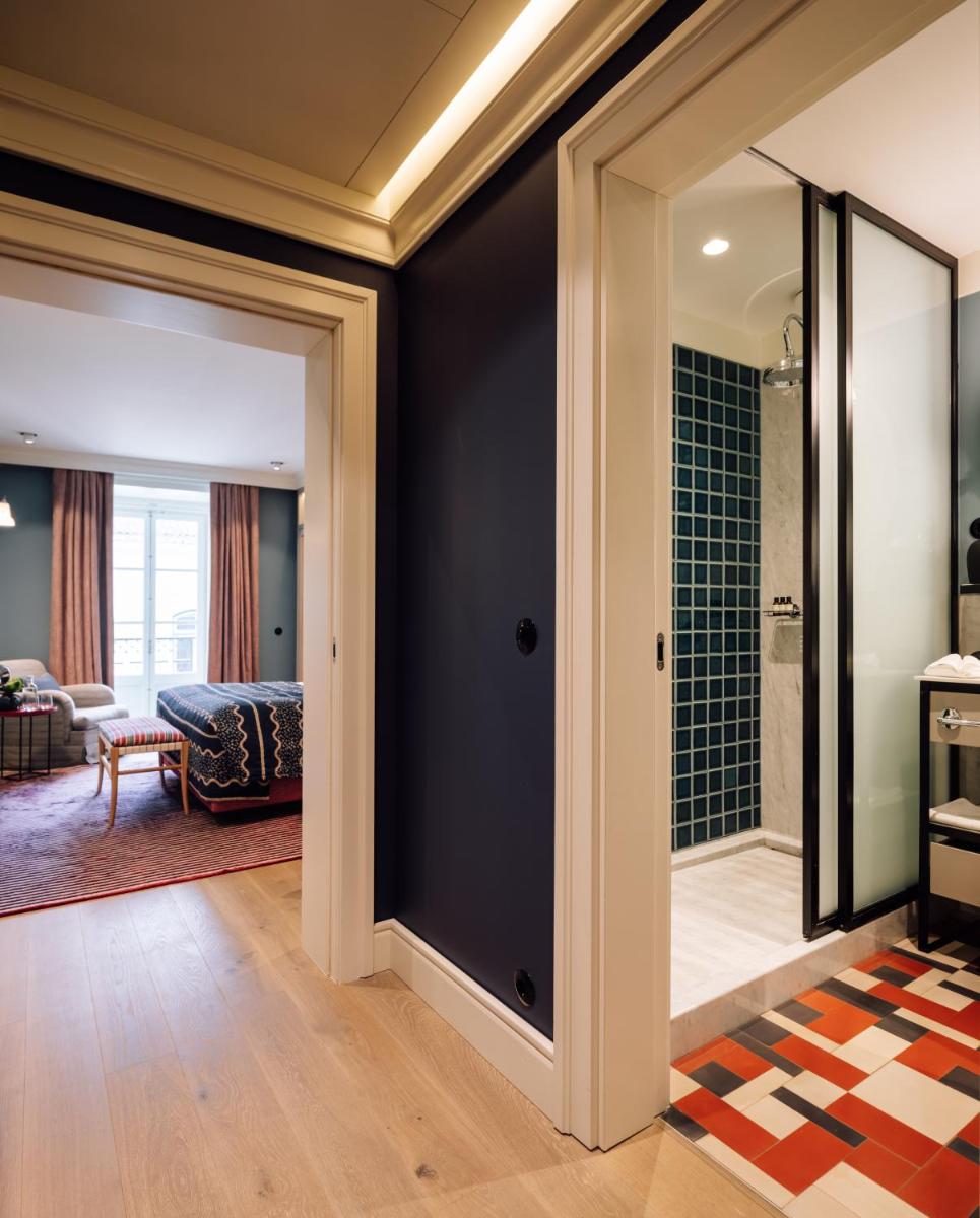 Uma cama ou camas num quarto em Bairro Alto Hotel
