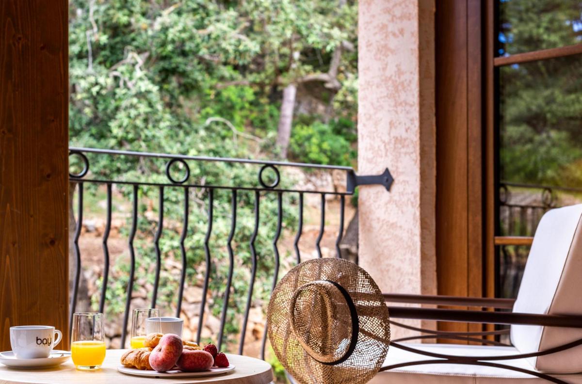 Un balcón o terraza de Hotel Creu de Tau Art&Spa-Adults only