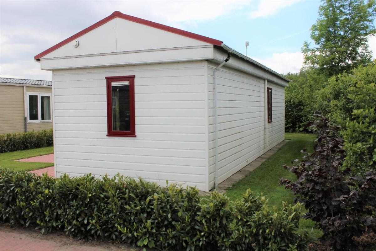 Hofgalow Chalet op camping "De Stal" - Housity