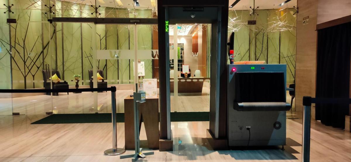 a display case in a store with a display at Welcomhotel by ITC Hotels, Richmond Road, Bengaluru in Bengaluru