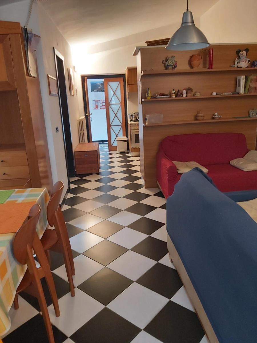 Attico con terrazzo e finestre sulla baia di Peschici - Housity