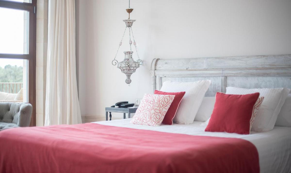 Cama o camas de una habitación en Casa Anamaria Hotel