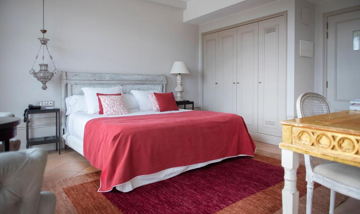 Cama o camas de una habitación en Casa Anamaria Hotel