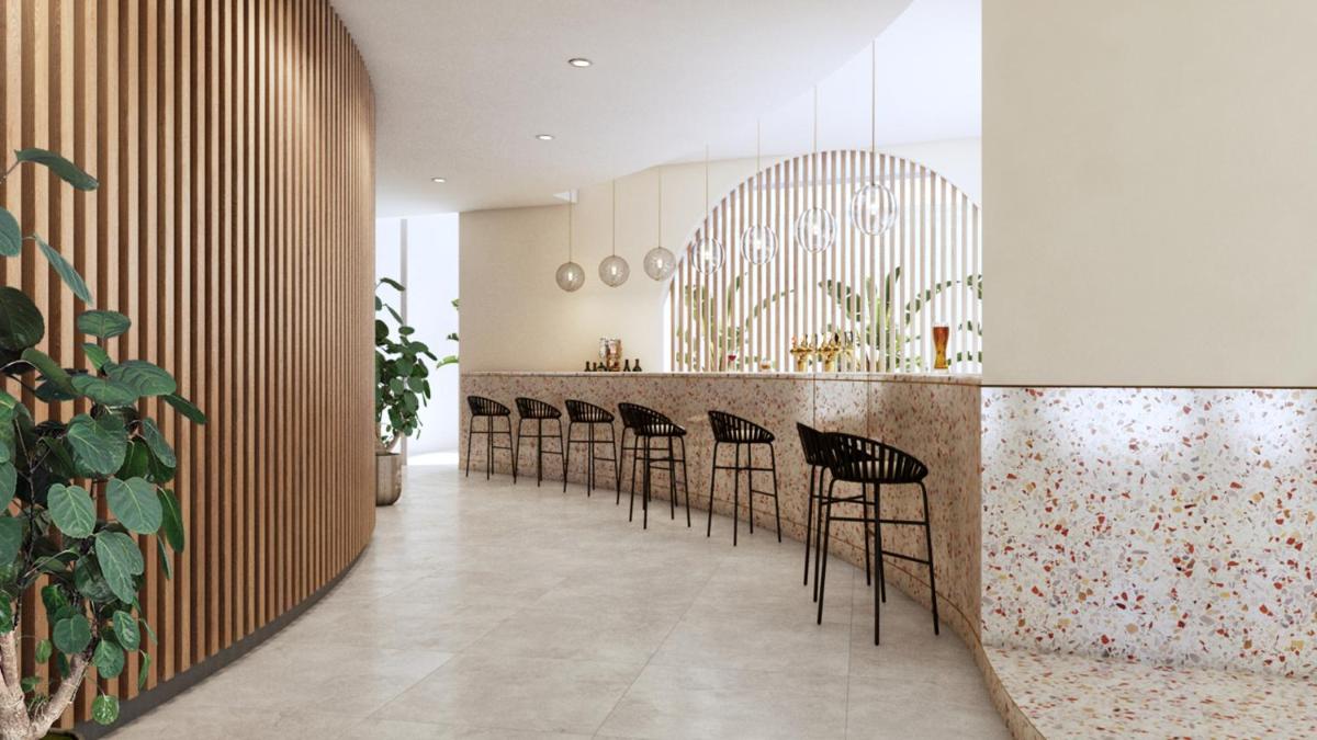 Um restaurante ou outro lugar para comer em Eden Villas & Apartments