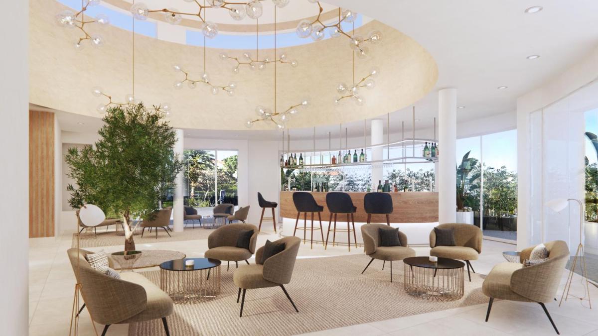 Uma área de estar em Eden Villas & Apartments