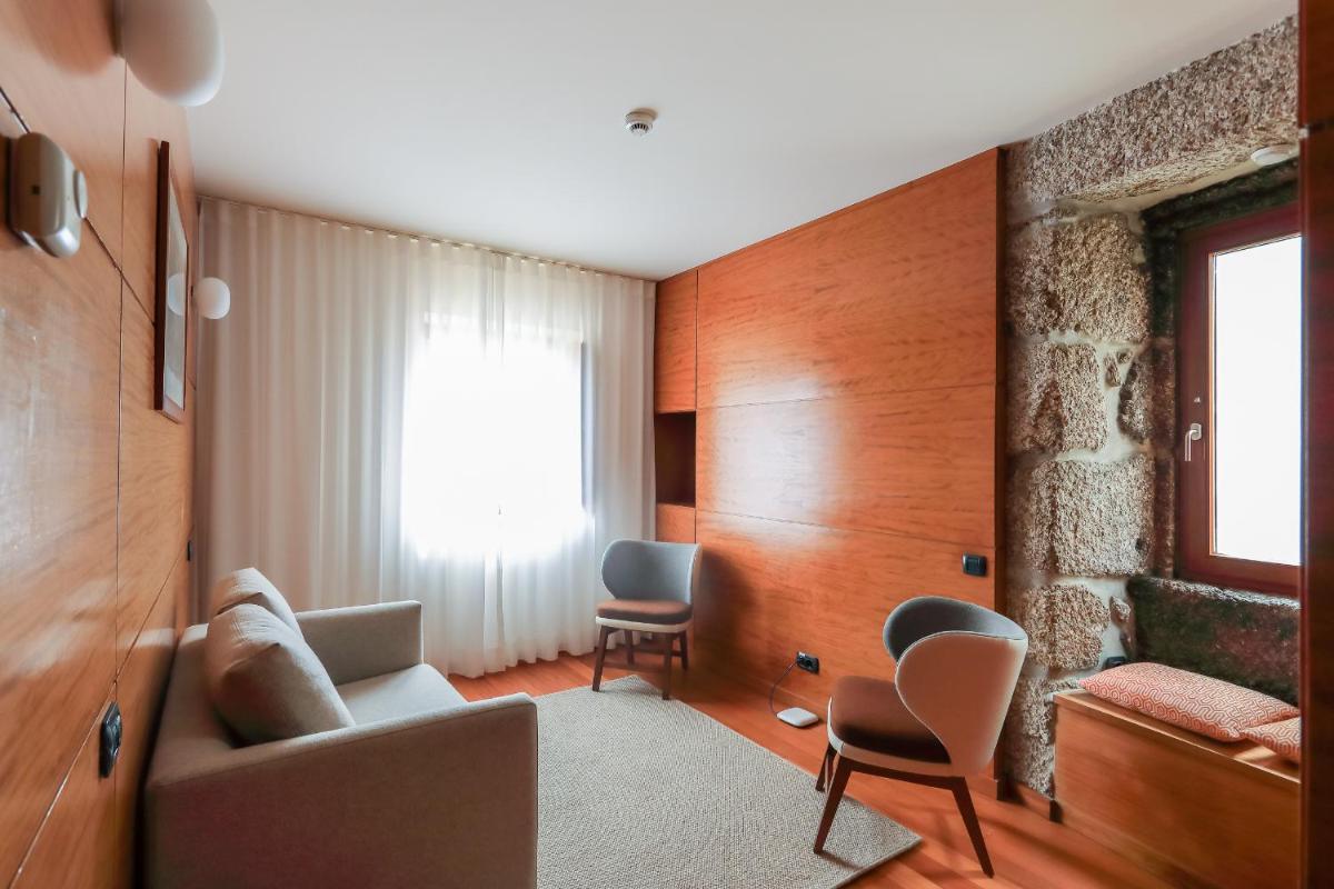 Uma área de estar em Casas Da Lapa, Nature & Spa Hotel