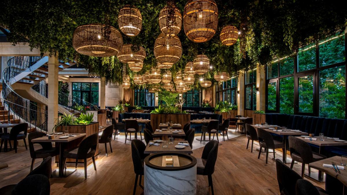Restaurant ou autre lieu de restauration dans l'établissement Les Jardins d'Epicure