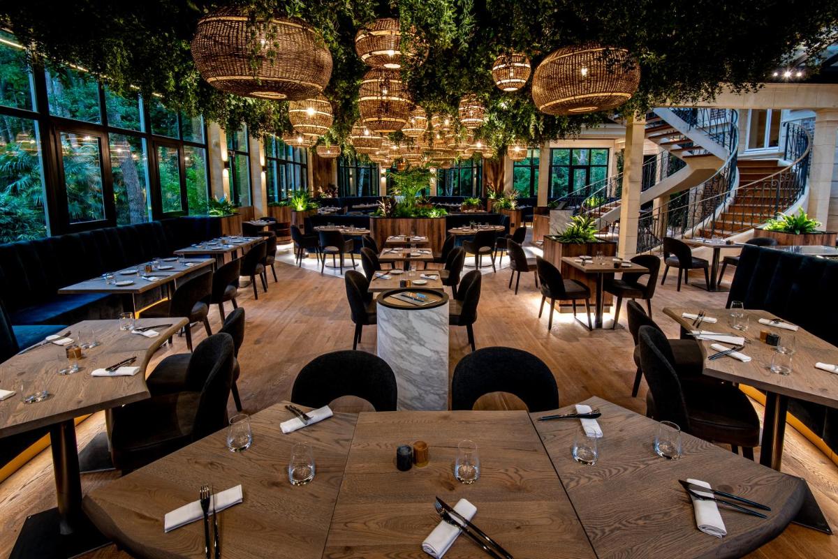 Restaurant ou autre lieu de restauration dans l'établissement Les Jardins d'Epicure