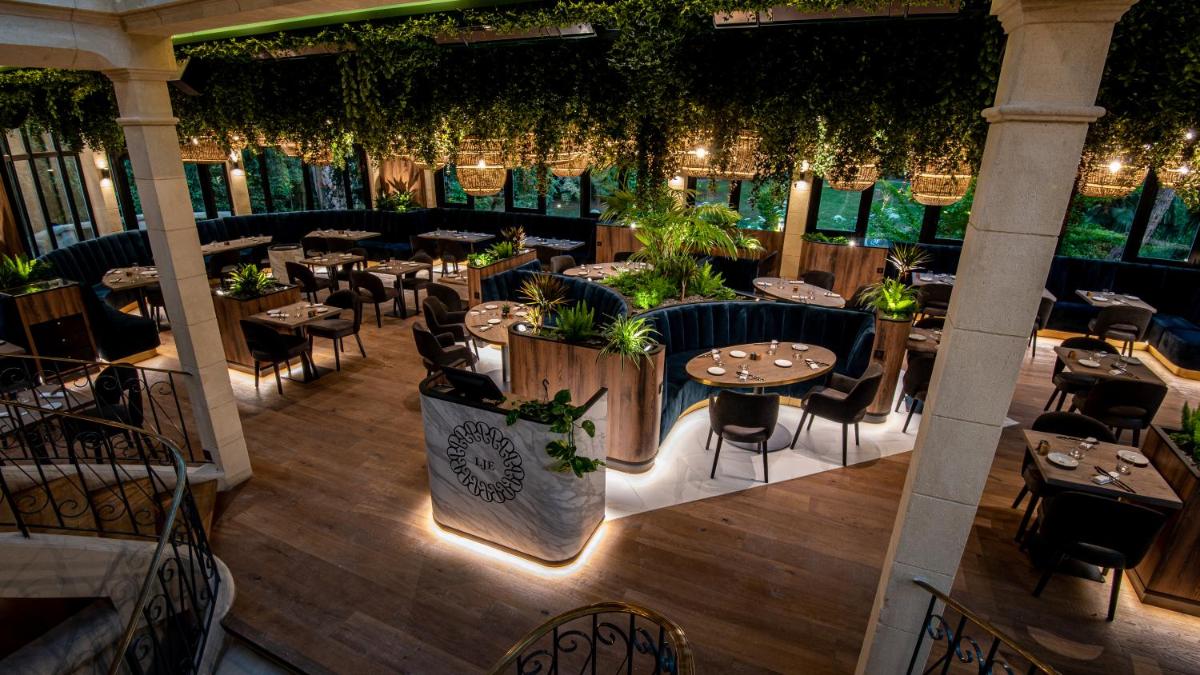 Restaurant ou autre lieu de restauration dans l'établissement Les Jardins d'Epicure