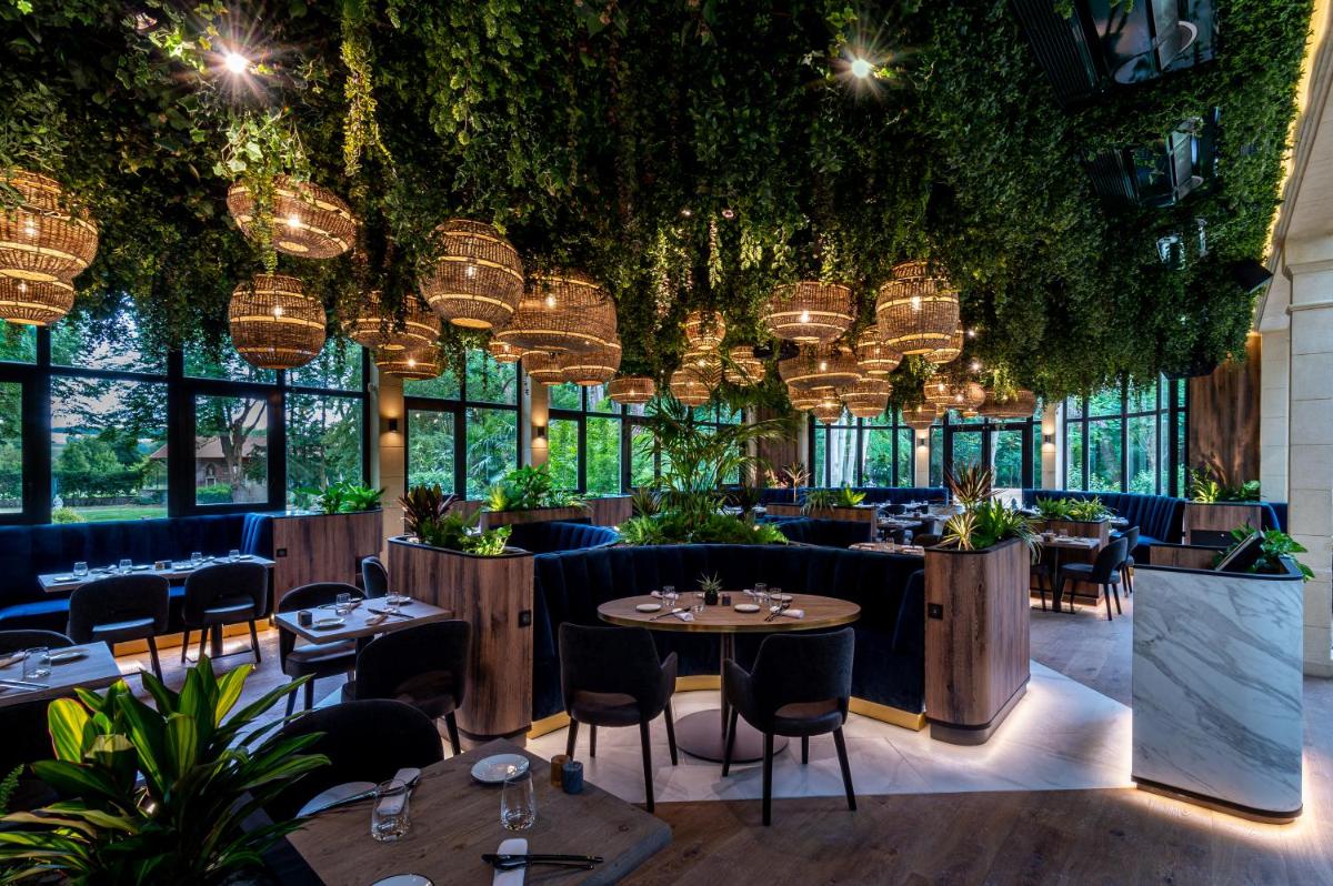 Restaurant ou autre lieu de restauration dans l'établissement Les Jardins d'Epicure