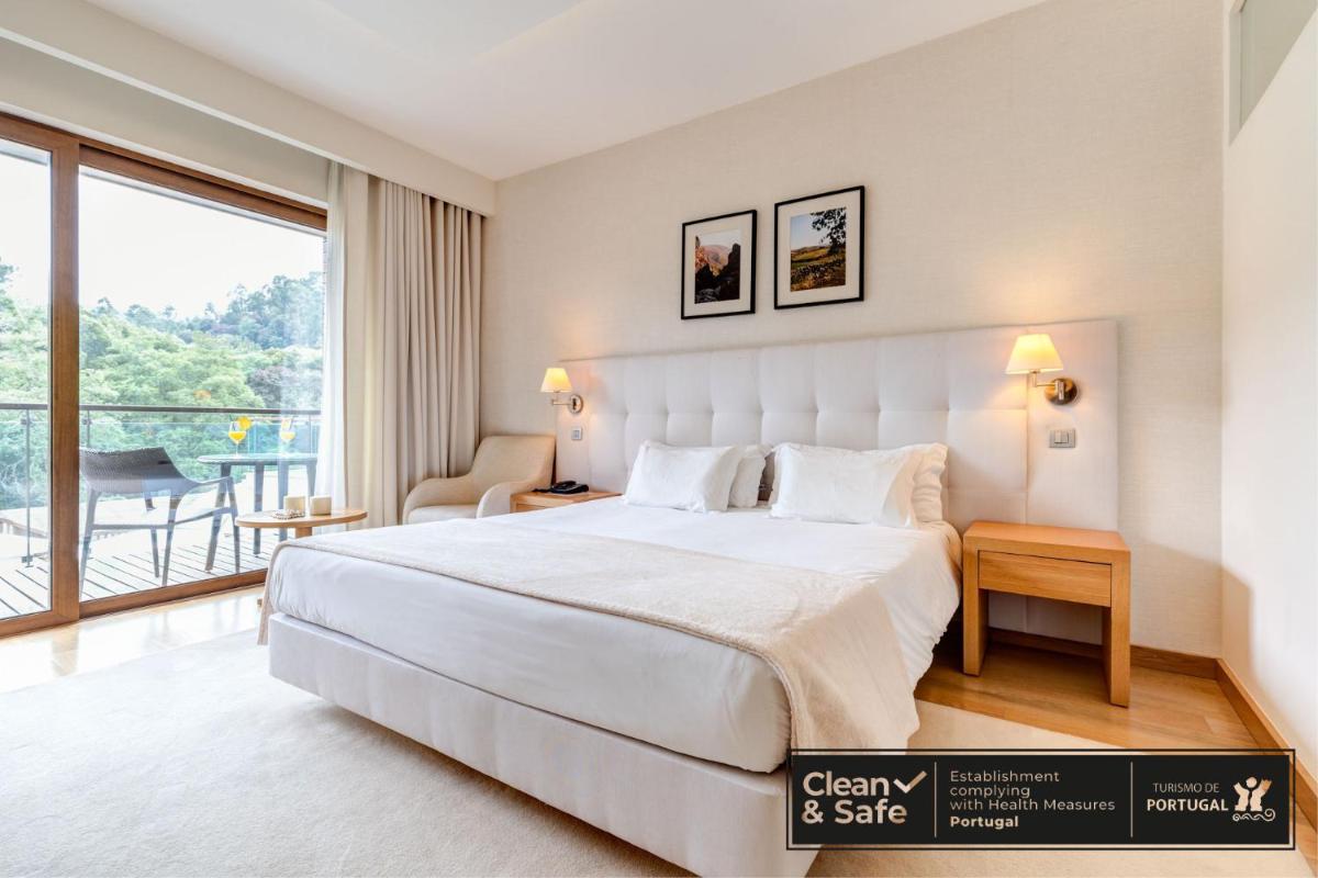 Uma cama ou camas num quarto em Hotel Rural Vale Do Rio