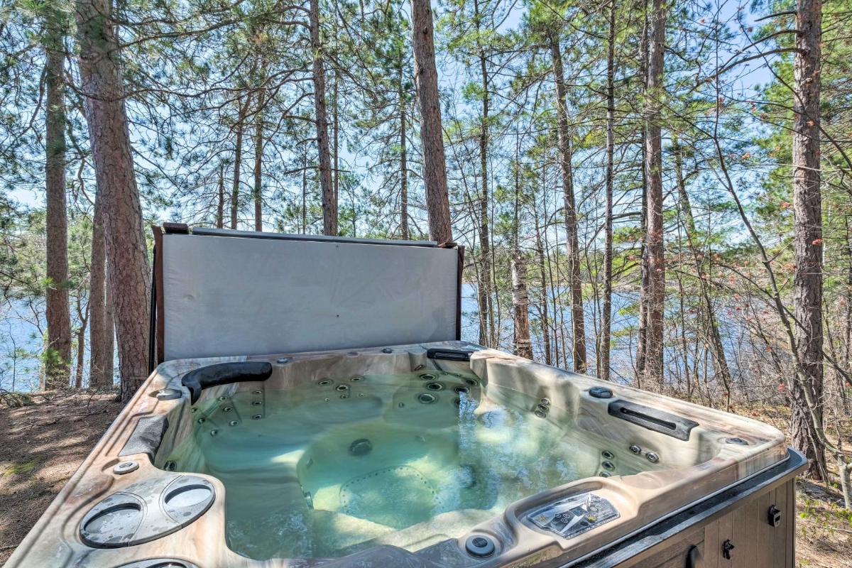 Quiet Waterfront Cabin with Dock, Game Room, Hot Tub - Housity