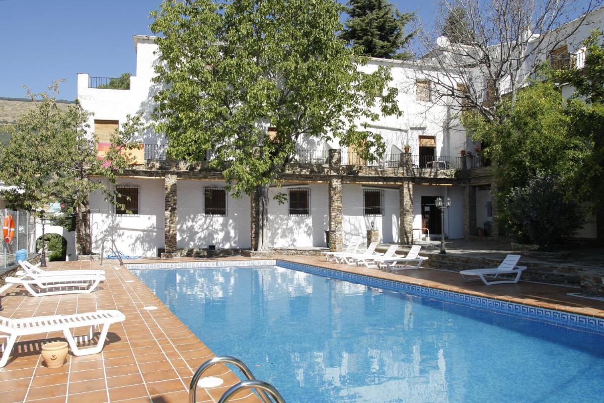 Apartamentos Rurales Poqueira - Housity