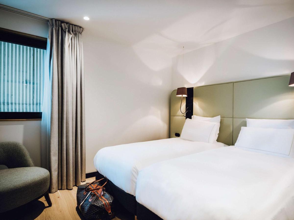 Un ou plusieurs lits dans un hébergement de l'établissement Sainte-Barbe Hotel & Spa Le Conquet - MGallery Collection