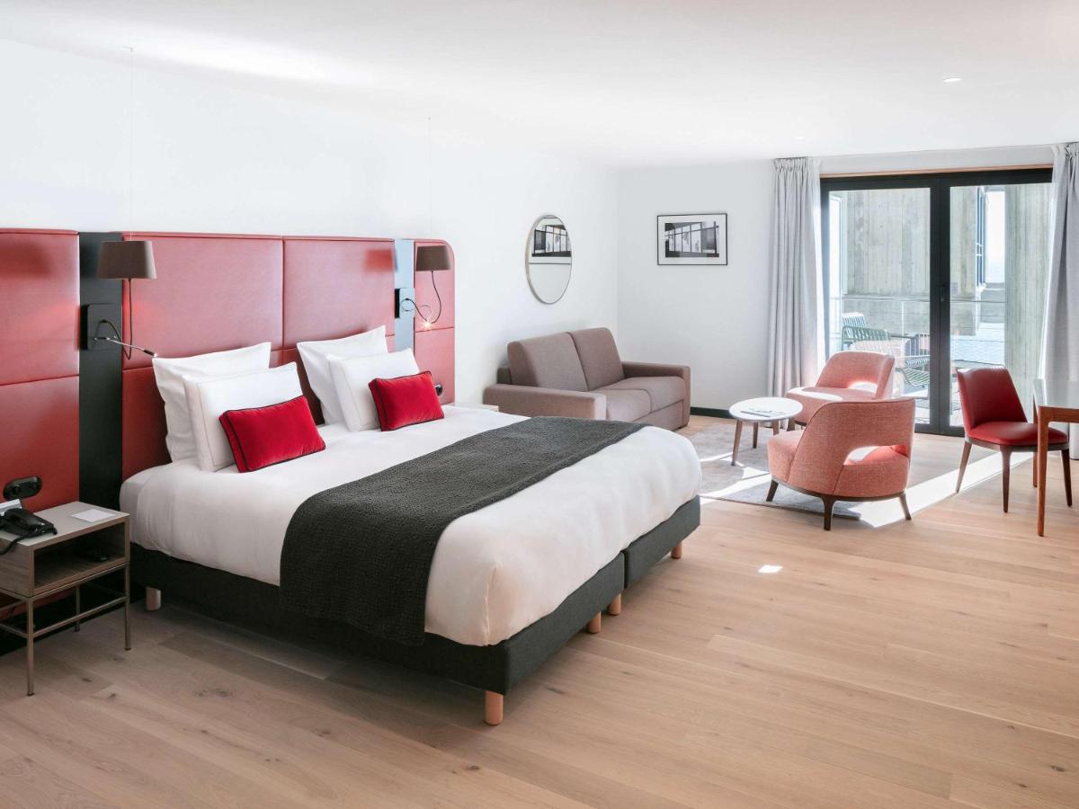 Un ou plusieurs lits dans un hébergement de l'établissement Sainte-Barbe Hotel & Spa Le Conquet - MGallery Collection