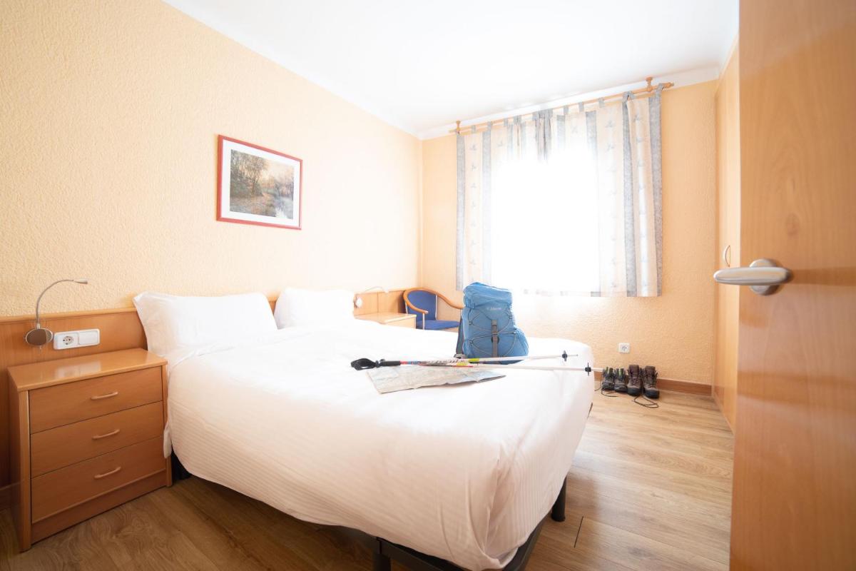 Cama o camas de una habitación en Cerdanya Viva Ecoestades