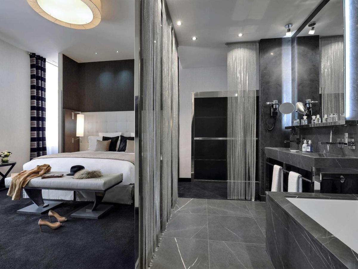 Un ou plusieurs lits dans un hébergement de l'établissement La Cour des Consuls Hotel & Spa Toulouse - MGallery Collection