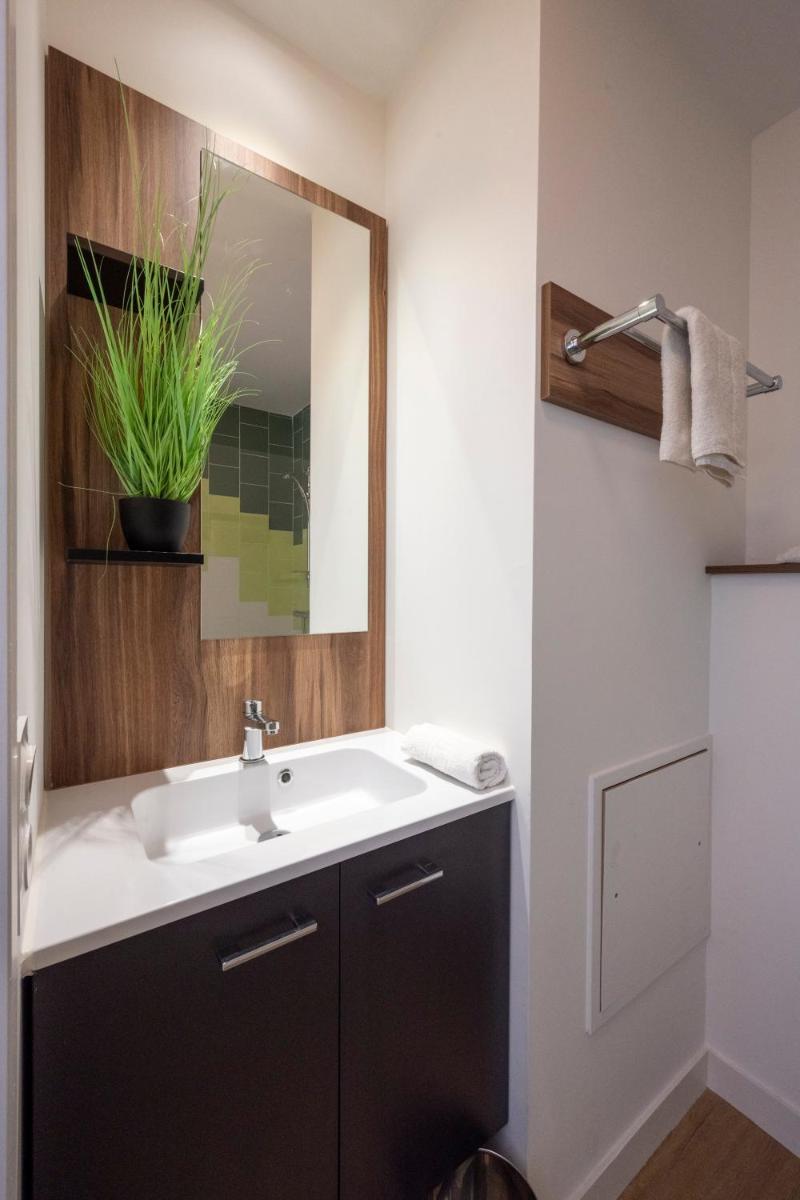 Salle de bains dans l'établissement ATHOME RESIDENCE ET SPA