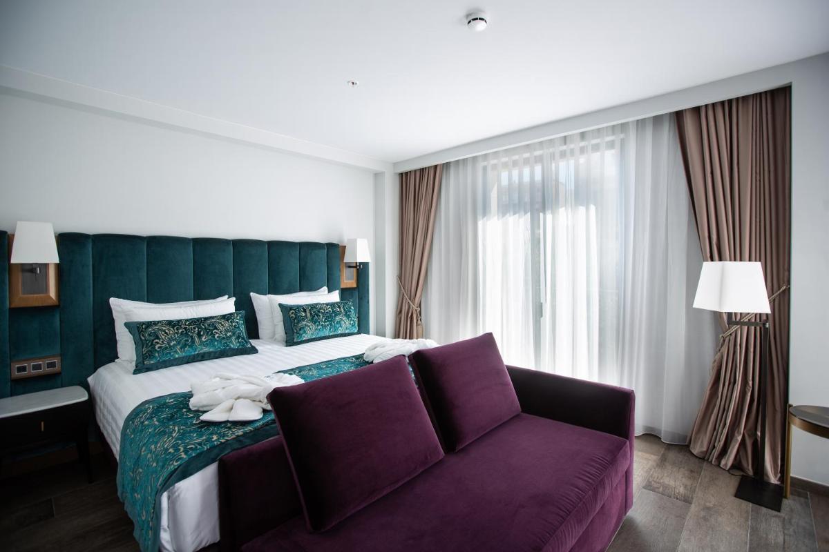 Cama o camas de una habitación en Boutique Hotel Élke Spa Superior
