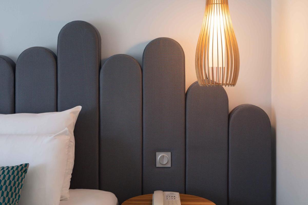 Un ou plusieurs lits dans un hébergement de l'établissement Mercure Aix-les-Bains Domaine de Marlioz Hôtel & Spa